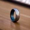 Damascus Steel Ring Twist Pattern with Blue Pakka wood sleeve for comfort wear - Image 6